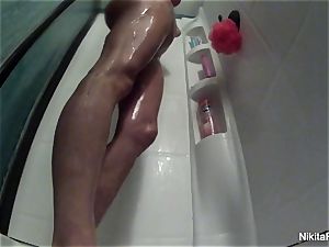Nikita takes a wonderful shower