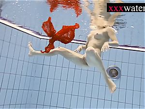 marvelous scorching damsel swimming in the pool